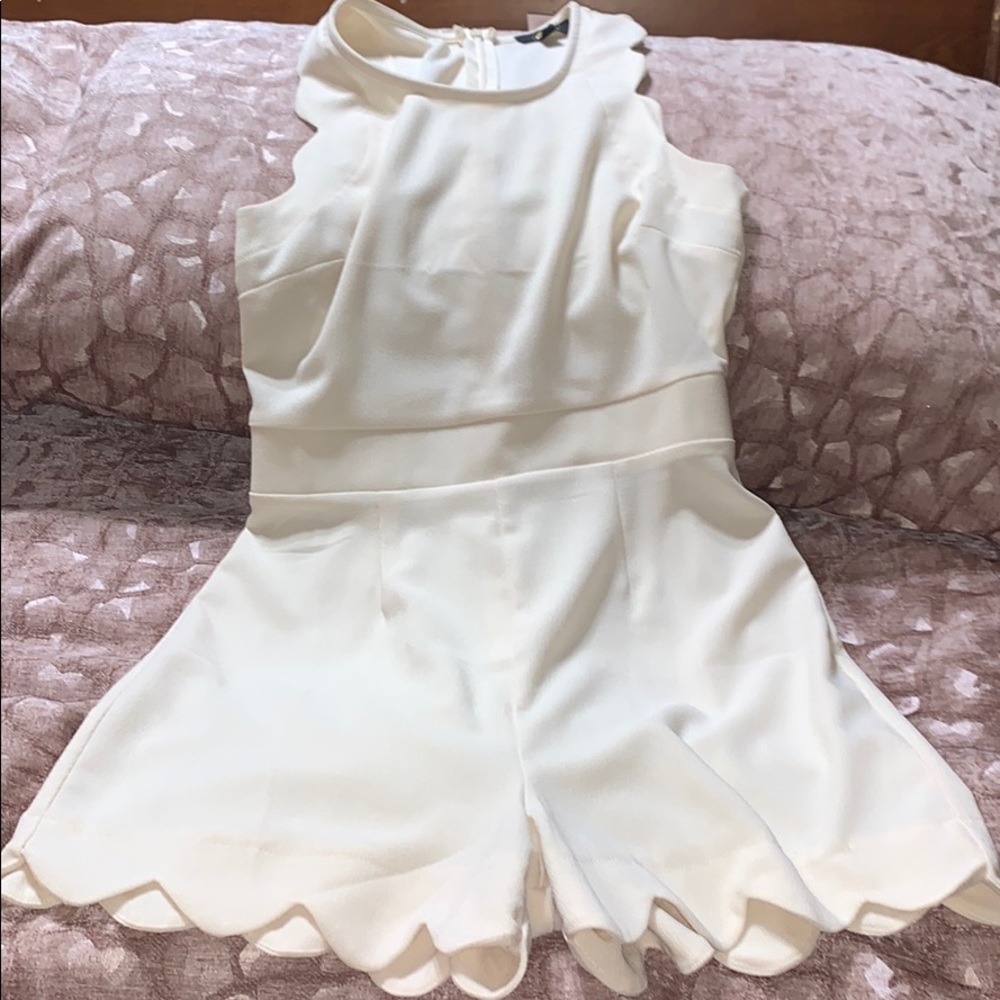 Ivory shorts romper with tags zipper in back